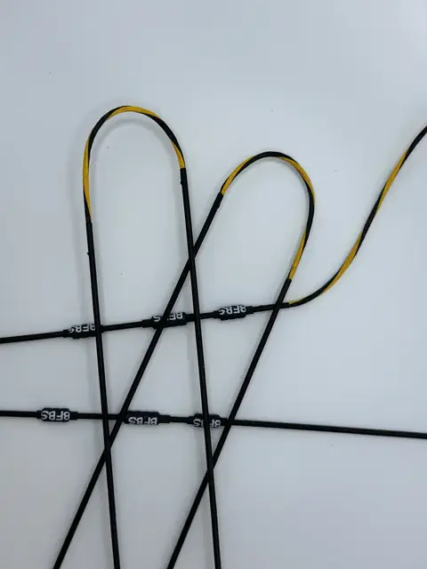 A finished set in Buckskin/Black with Black serving, coiled on white.
