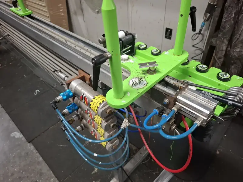 Blue and pink strands laid up on the jig.