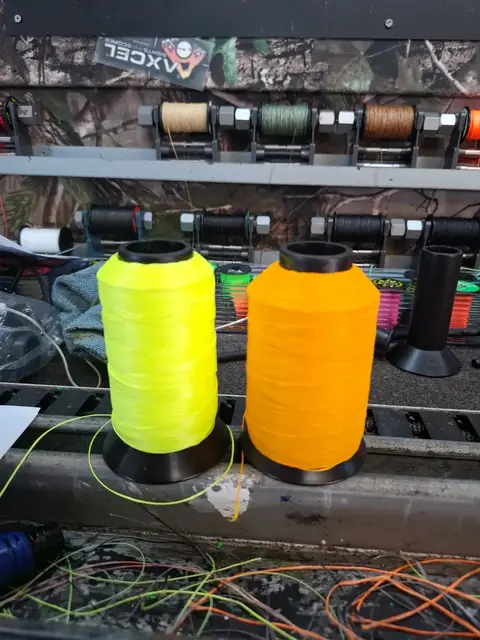 Orange and yellow string material on the rack.